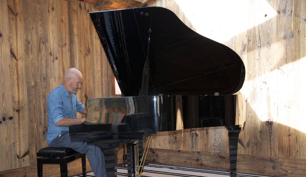 Michael e plays the piano in Chalet Les Anges, Zermatt